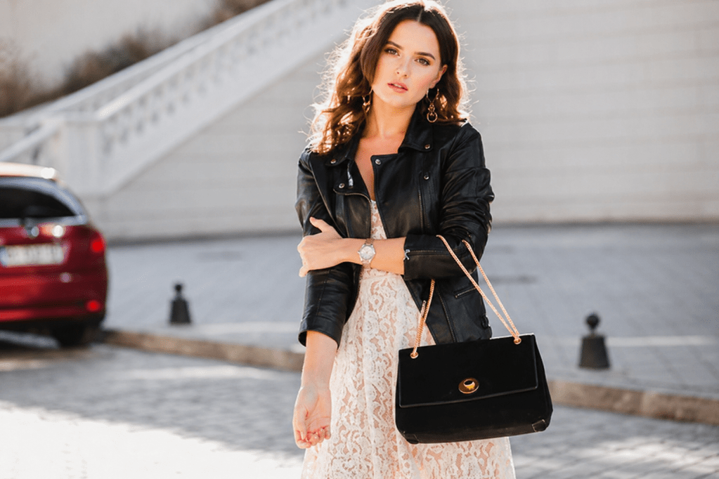 women posing with stylish bag